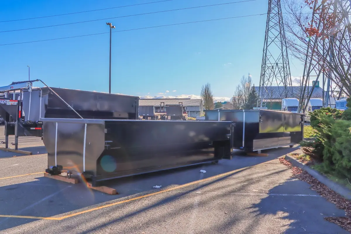 Roll-off dumpster ready for waste disposal at job site for Demolition Dumpster Rental in Tewksbury